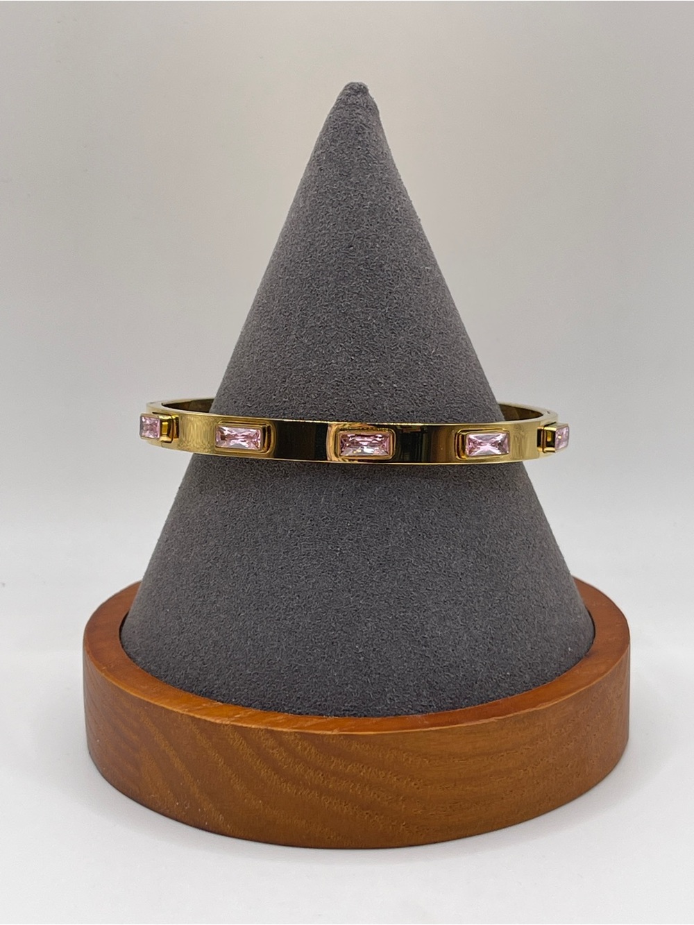 Gold Hinged Bangle Bracelet with Pink Gem Accents